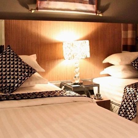 Arenaa Deluxe Hotel Малакка Номер фото